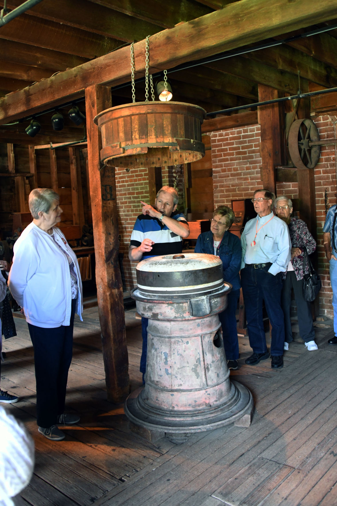 006 Marge Bredow, Elsie and Walt Goertzen, Joann Bower listen to Don, the tour guide, at the mill.JPG